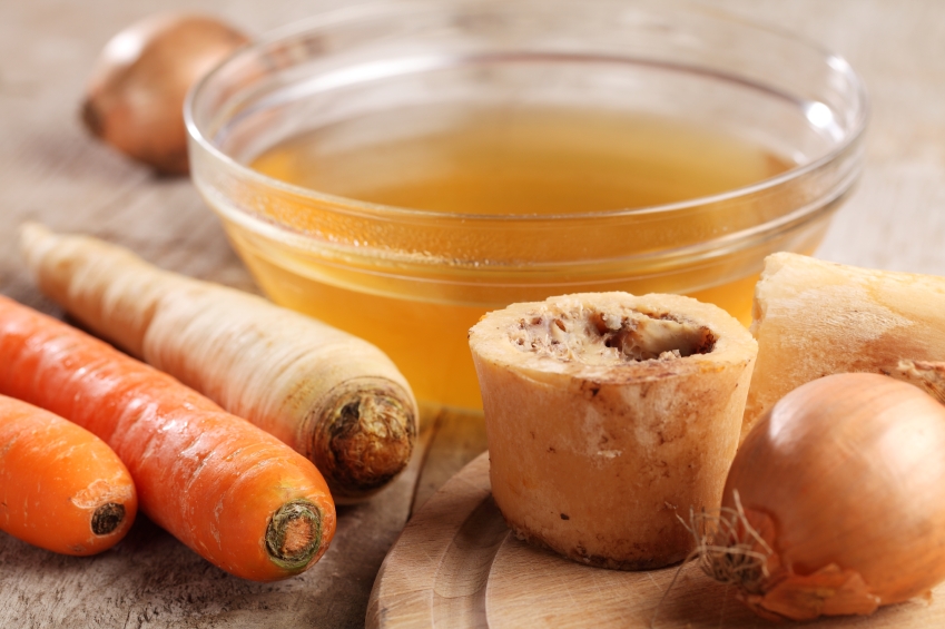 Bowl of bone broth with ingredients