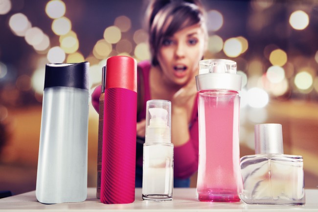 Woman purchasing cosmetics. 