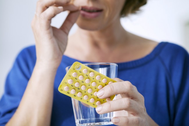 Woman having a tablet.