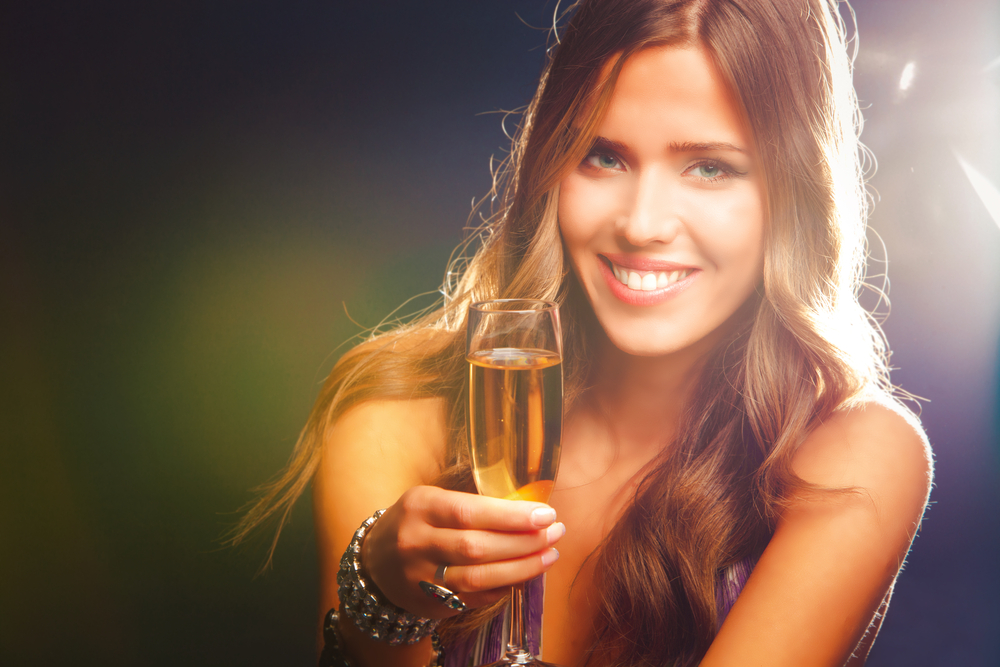 Woman drinking champagne