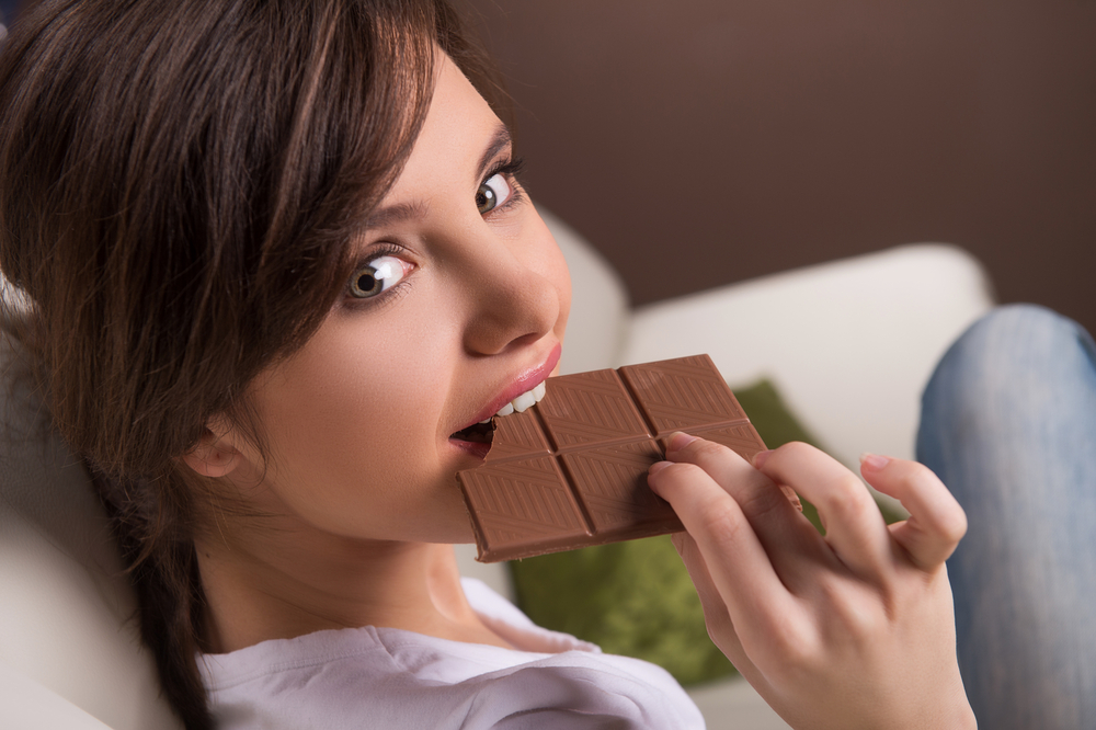 Woman having chocolate