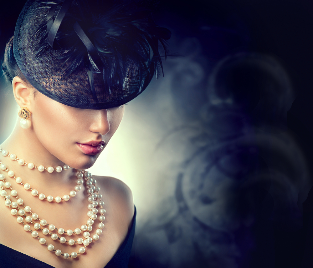 Woman wearing pearl necklace