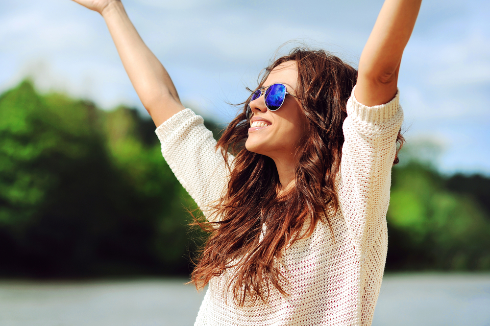 Beautiful woman enjoying the sunshine