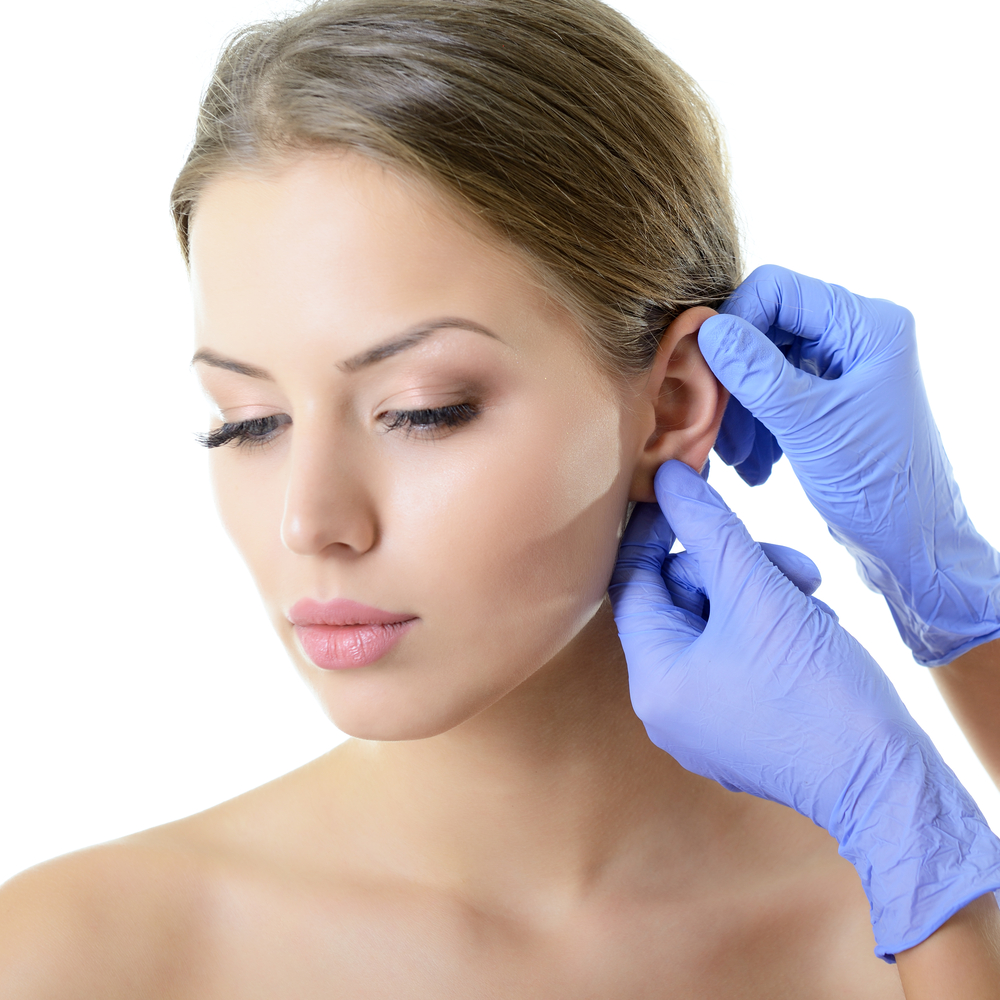 Woman  getting her ear checked