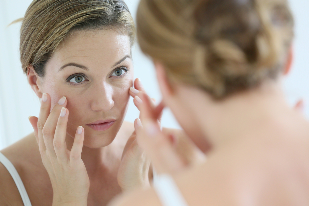 Woman looking in the mirror