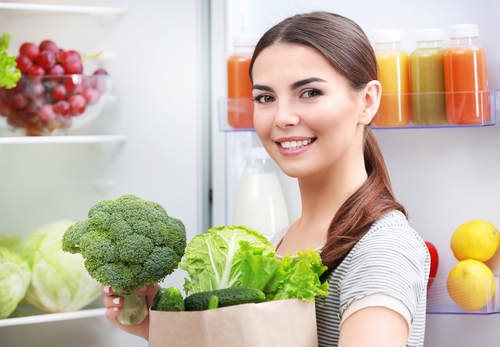 Woman with broccoli