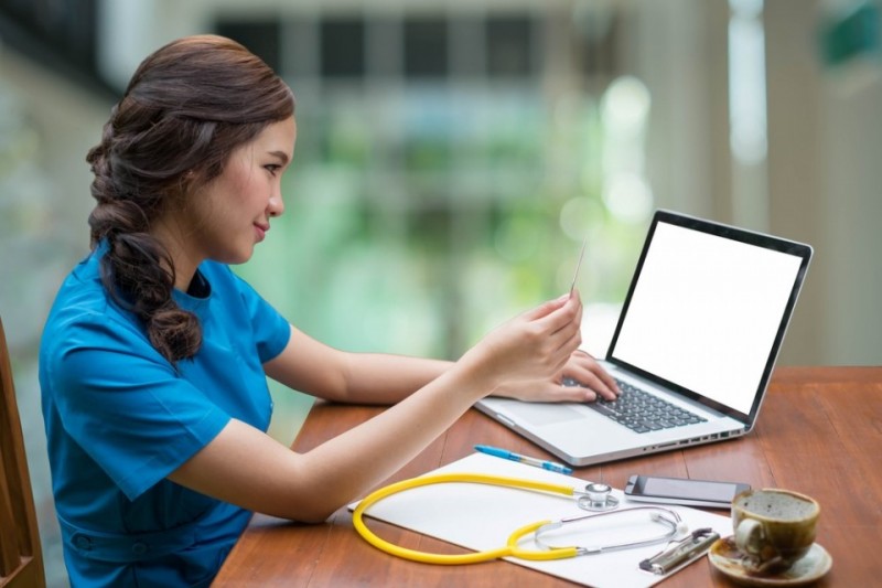 nurse using a laptop