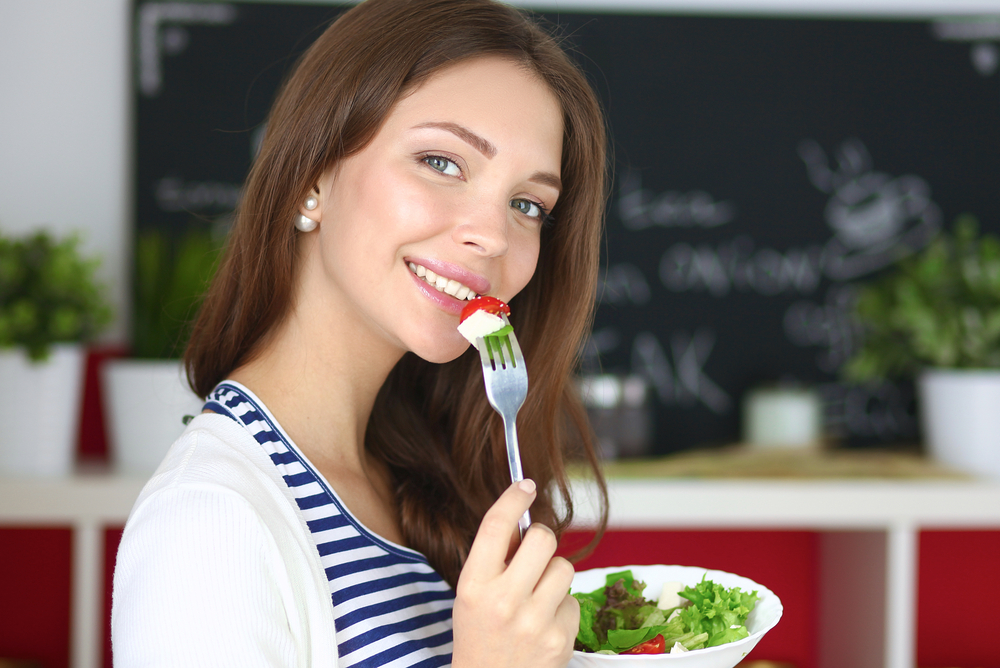 Woman eating healthy food