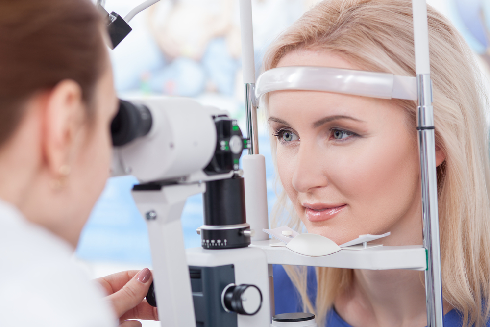 Woman getting eye examined