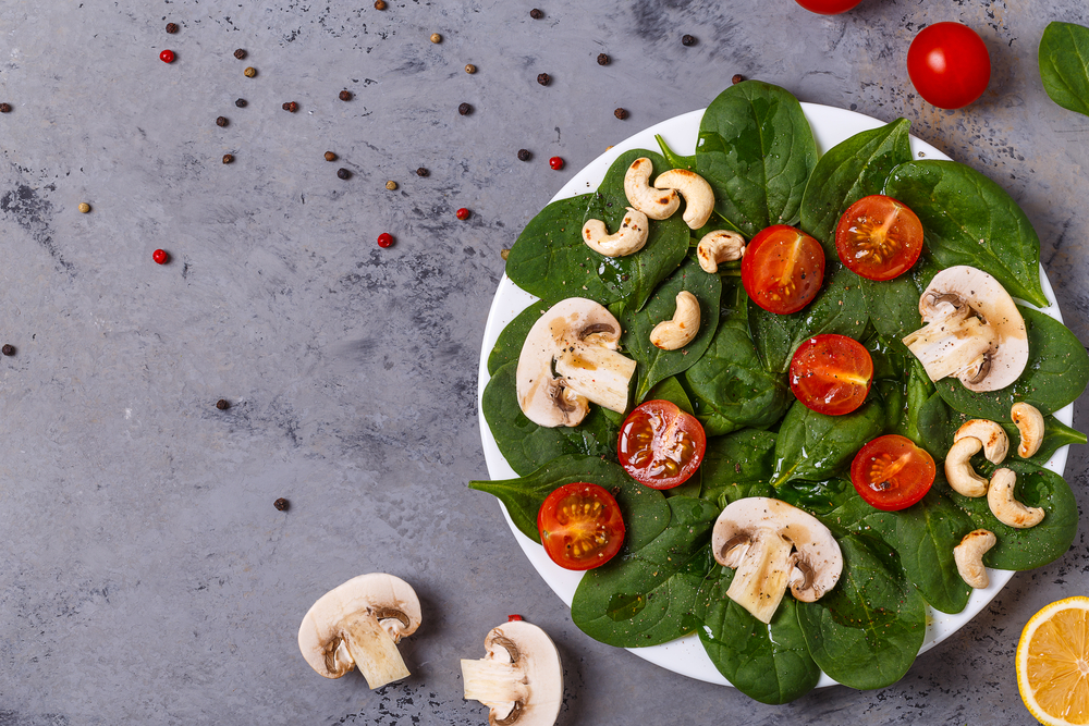 Mushroom, nuts, and spinach salad