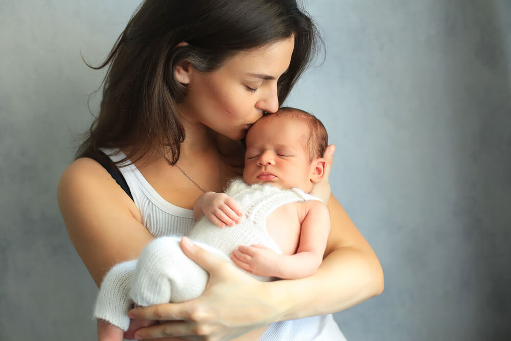 Woman holding her baby