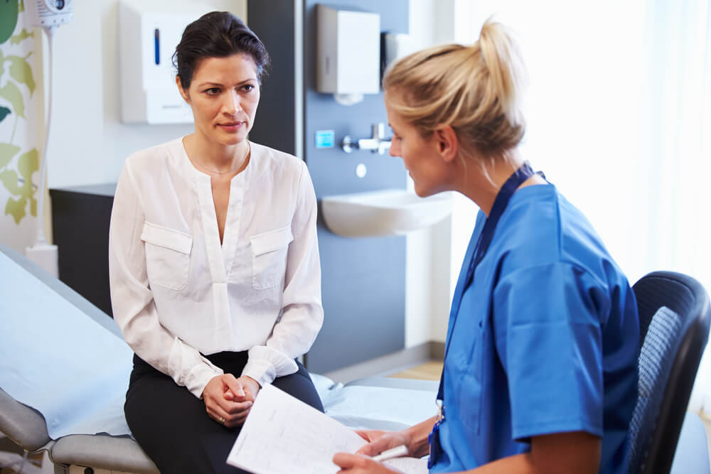 Female patient seeking doctor's consultation