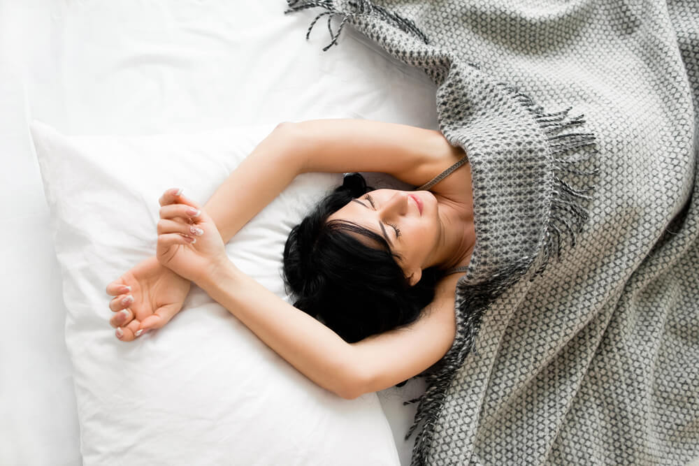 woman sleeping on her back