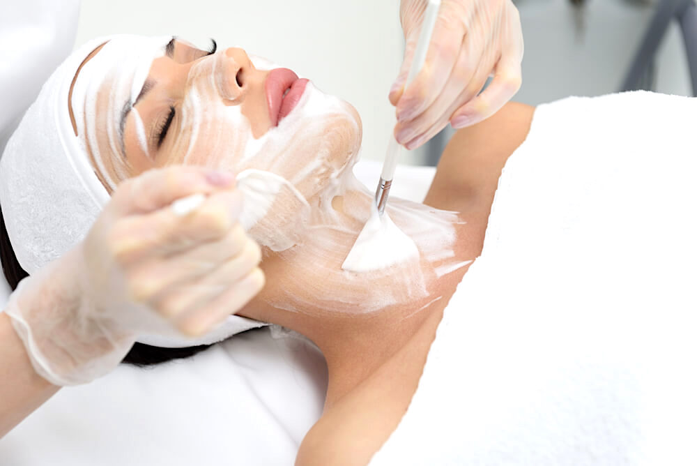 Woman undergoing a neck mask treatment